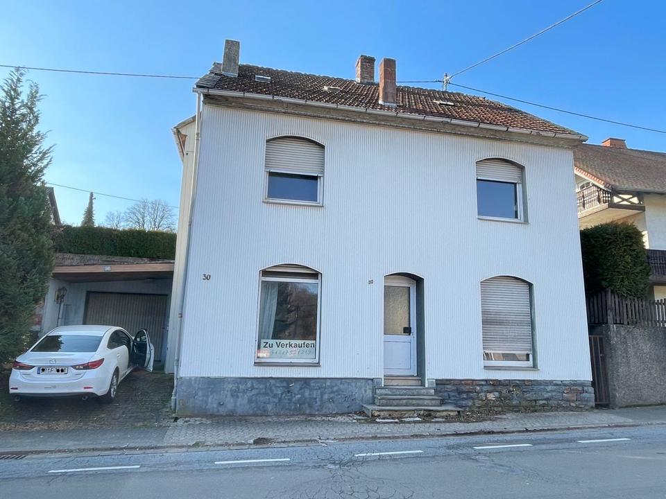 Thumbnail-Haus mit Garage – 3 Etagen mit Potenzial zur Renovierung