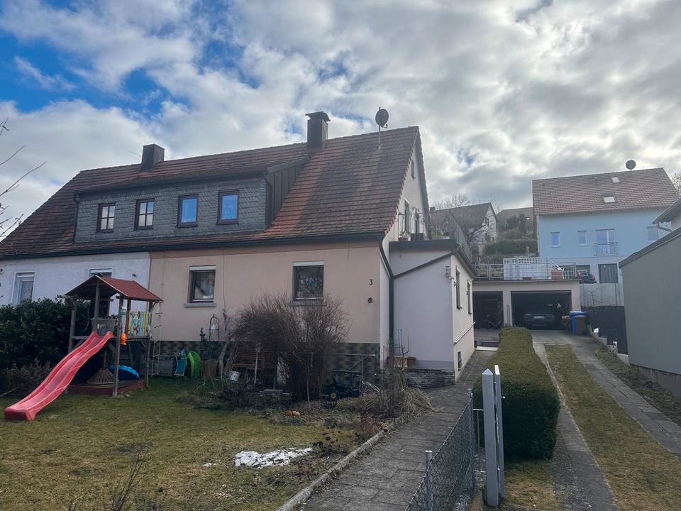 Thumbnail-Doppelhaushälfte mit DuplexStudio Wohnung und Doppelgarage