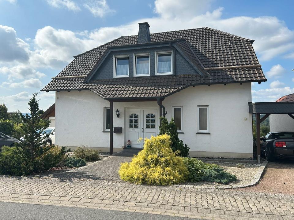 Thumbnail-Einfamilienhaus mit Garten und Garage in familienfreundlicher Wohnlage Arnsberg-Bruchhausen