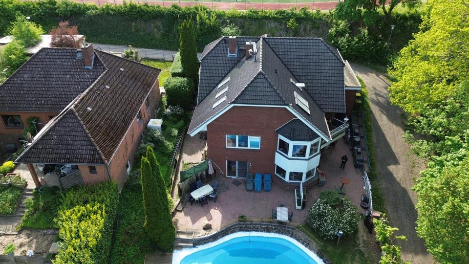 Thumbnail-Haus mit zwei Wohnungen in der obersten Etage