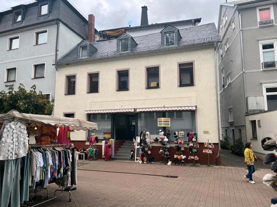 Thumbnail-Geschäfte und Haus