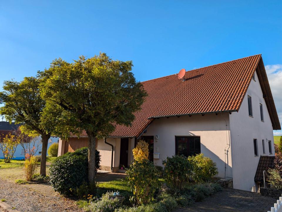 Thumbnail-Geräumiges Familienhaus mit vermieteter Einliegerwohnung