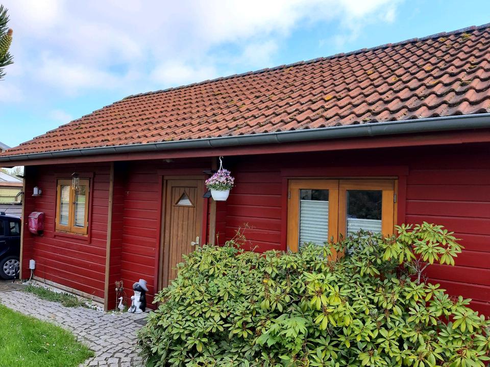 Thumbnail-Holzhaus mit Pultdachanbau und Keller