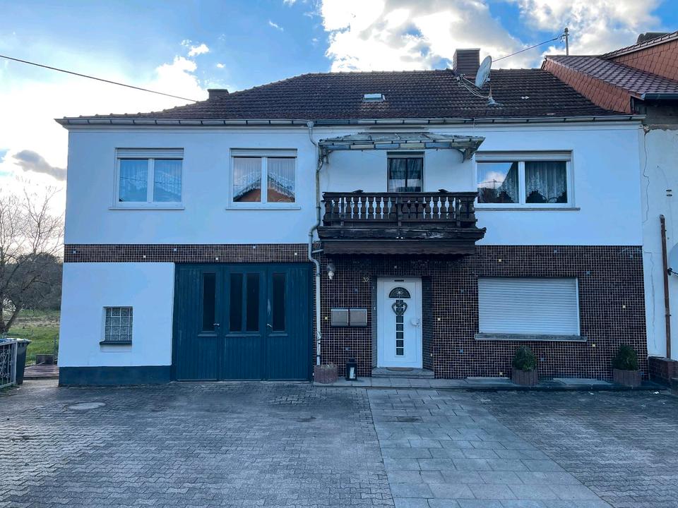 Thumbnail-zweigeschossiges Einfamilienhaus mit Garten