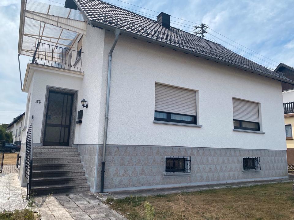 Thumbnail-Grundstück mit Zweifamilienhaus