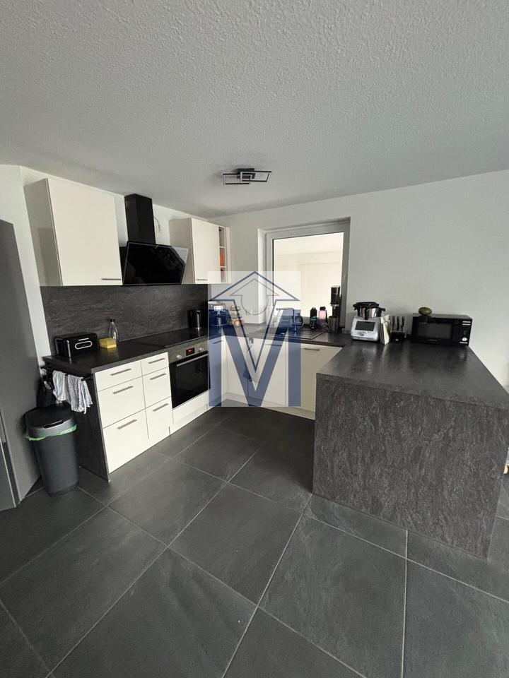 Thumbnail-Neuwertige 3-ZKB-Maisonette mit großem Balkon, Gartenanteil und Garage im EG Souterrain