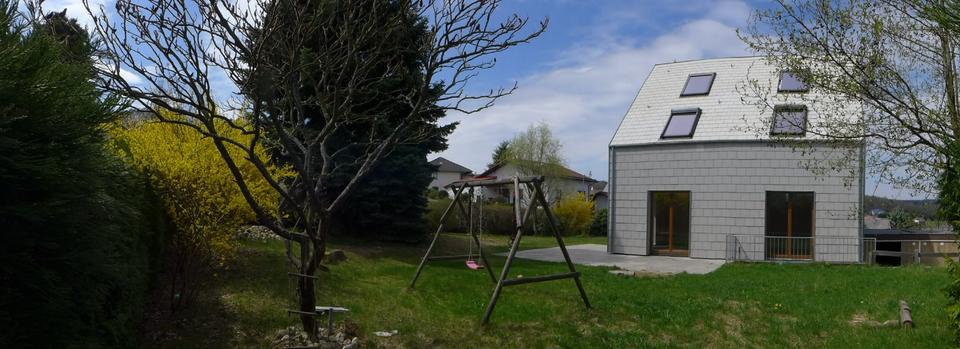 Thumbnail-Haus im Garten mit Dachstudio