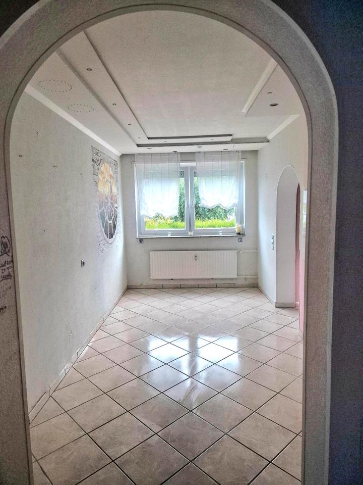 Thumbnail-Erdgeschosswohnung mit Garten und Grage