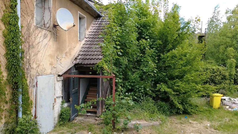 Thumbnail-sanierungsbedürftiges Mehrfamilienhaus