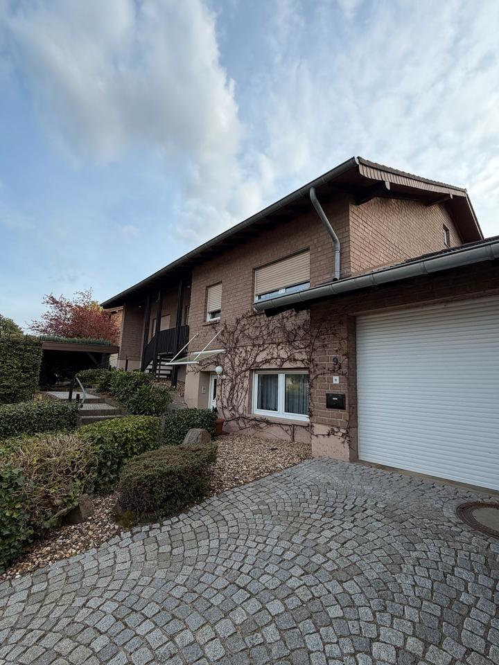 Thumbnail-Freistehendes Einfamilienhaus mit Garage
