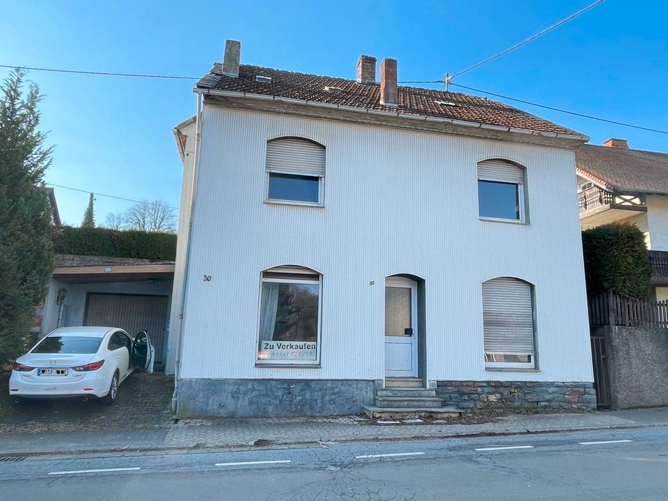 Thumbnail-Haus mit Garage nahe Bostalsee – Potenzial für 2 Wohneinheiten