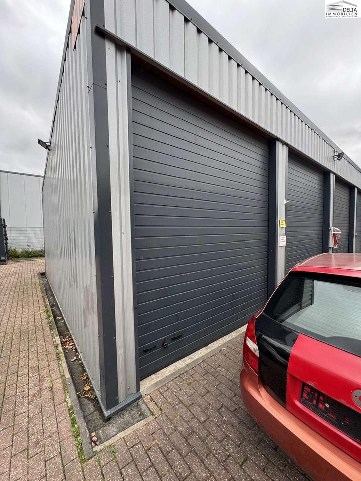 Thumbnail-Gewerbegrundstück mit Stellflächen, Waschplatz und großer Werkstattgarage.