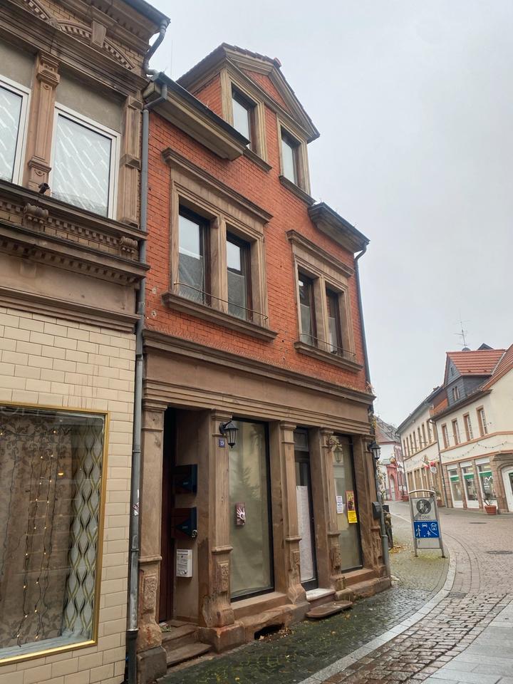 Thumbnail-Kleines Mehrfamilienhaus mit Ladenfläche