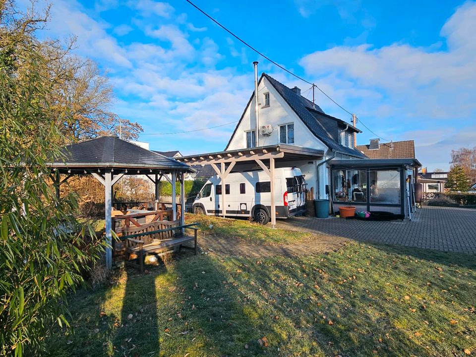 Thumbnail-Einfamilienhaus mit Garage + Carports