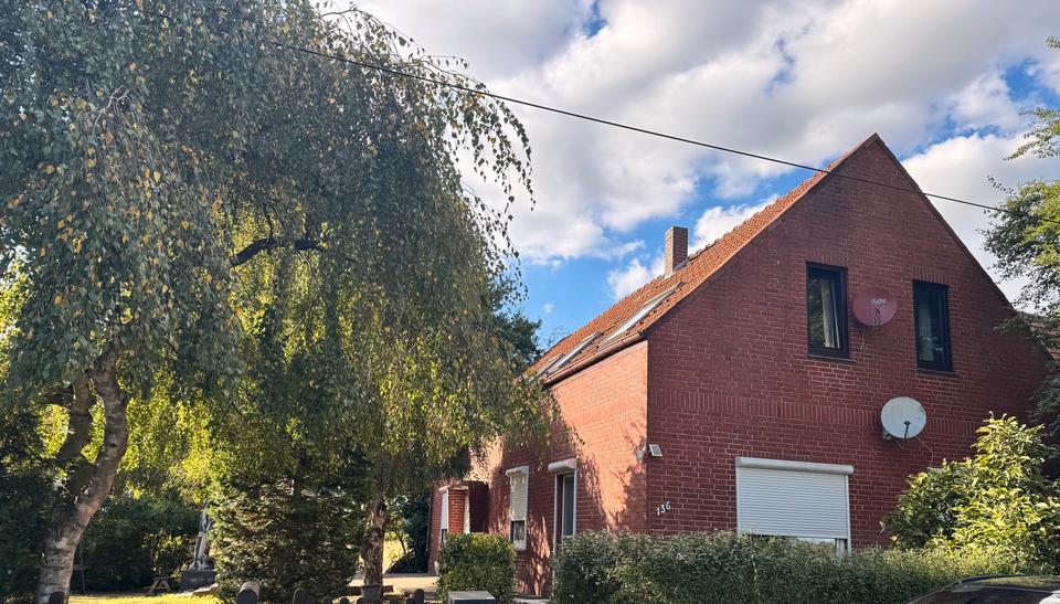 Thumbnail-Eigentumswohnung mit Doppelhaus Charakter und Garten