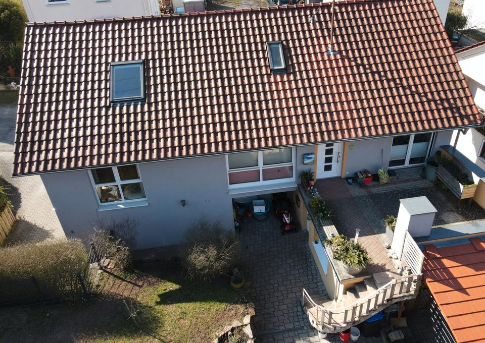 Thumbnail-Einfamilienhaus mit Einliegerwohnung mit Holzlege und Halle
