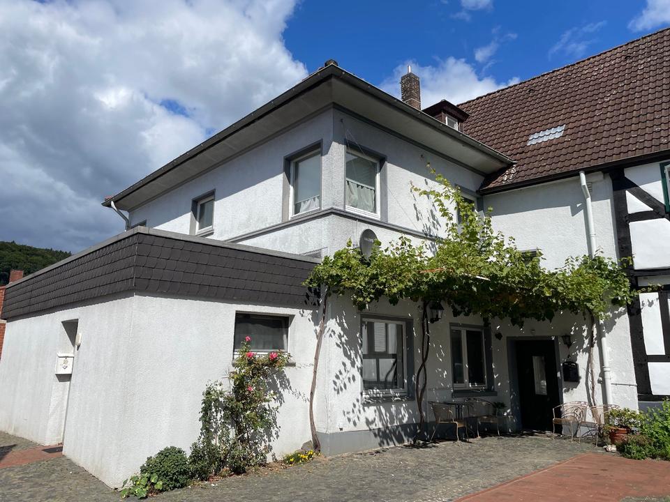 Thumbnail-Wohn- und Geschäftshaus mit Balkon, Gartenblick