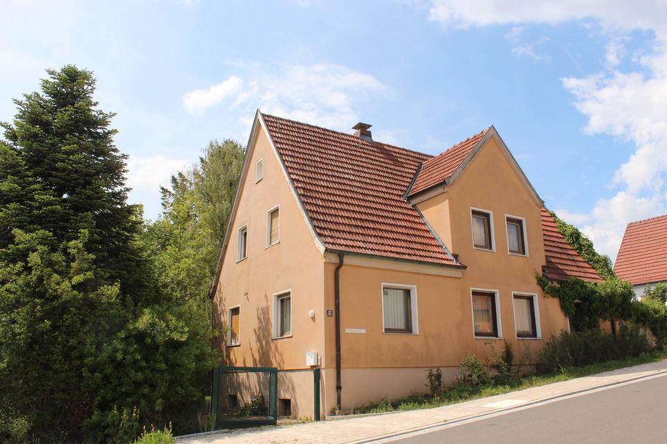Thumbnail-Freistehendes Einfamilienhaus mit Einliegerwohnung