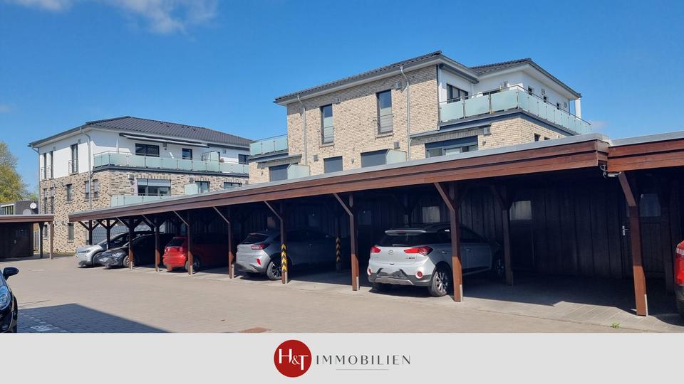 Thumbnail-Moderne KfW-55 EG-Wohnung mit Terrasse & Carport