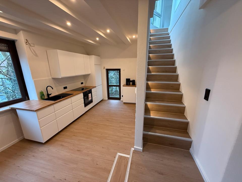 Thumbnail-Zentrale Wohnung mit privatem Garten und Dachterrasse