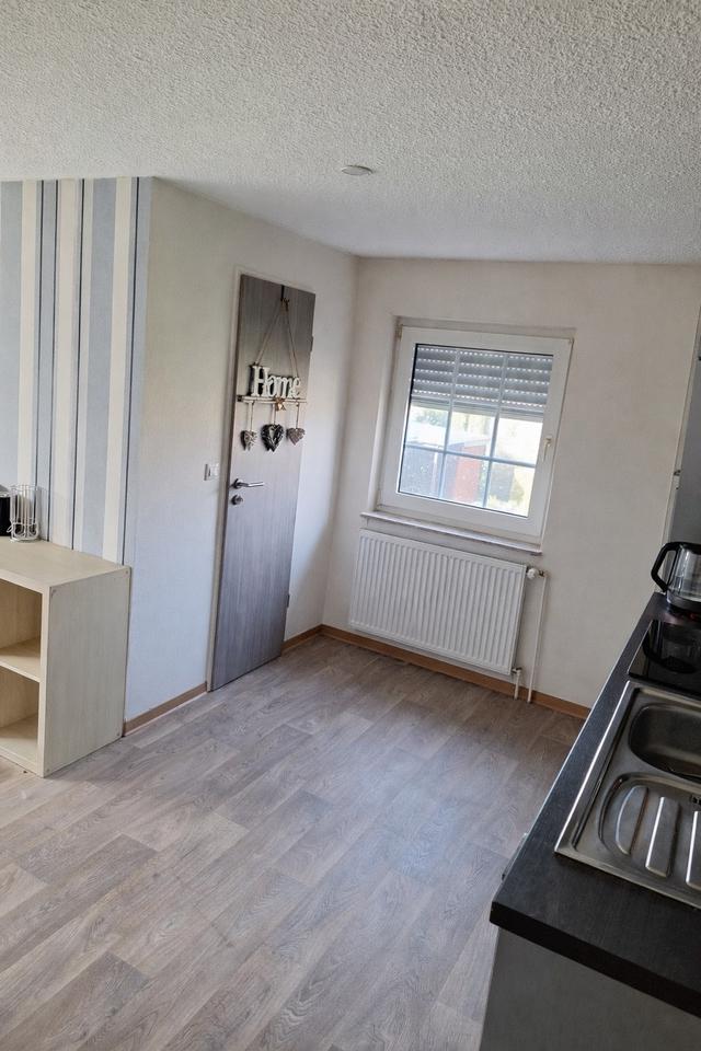 Thumbnail-Zentrale Obergeschosswohnung im Zweifamilienhaus in Warsingsfehn