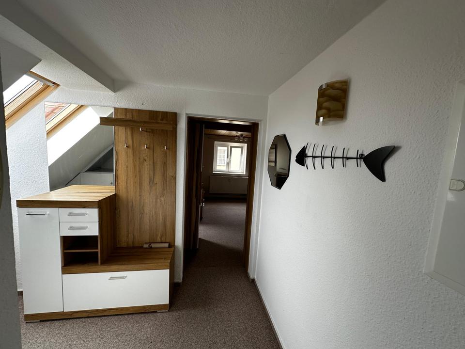 Thumbnail-1-Zimmer-DG-Wohnung mit Garten & Weitblick