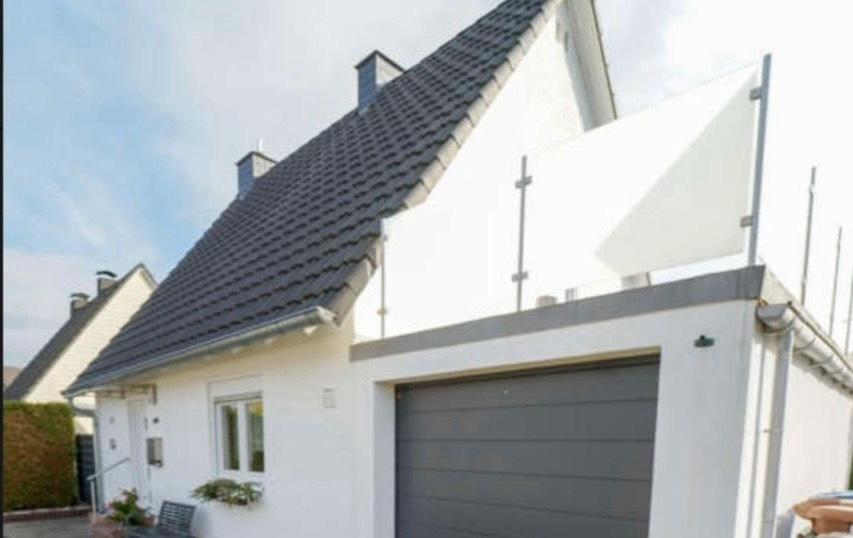 Thumbnail-Freistehendes Einfamilienhaus mit Dachterrasse