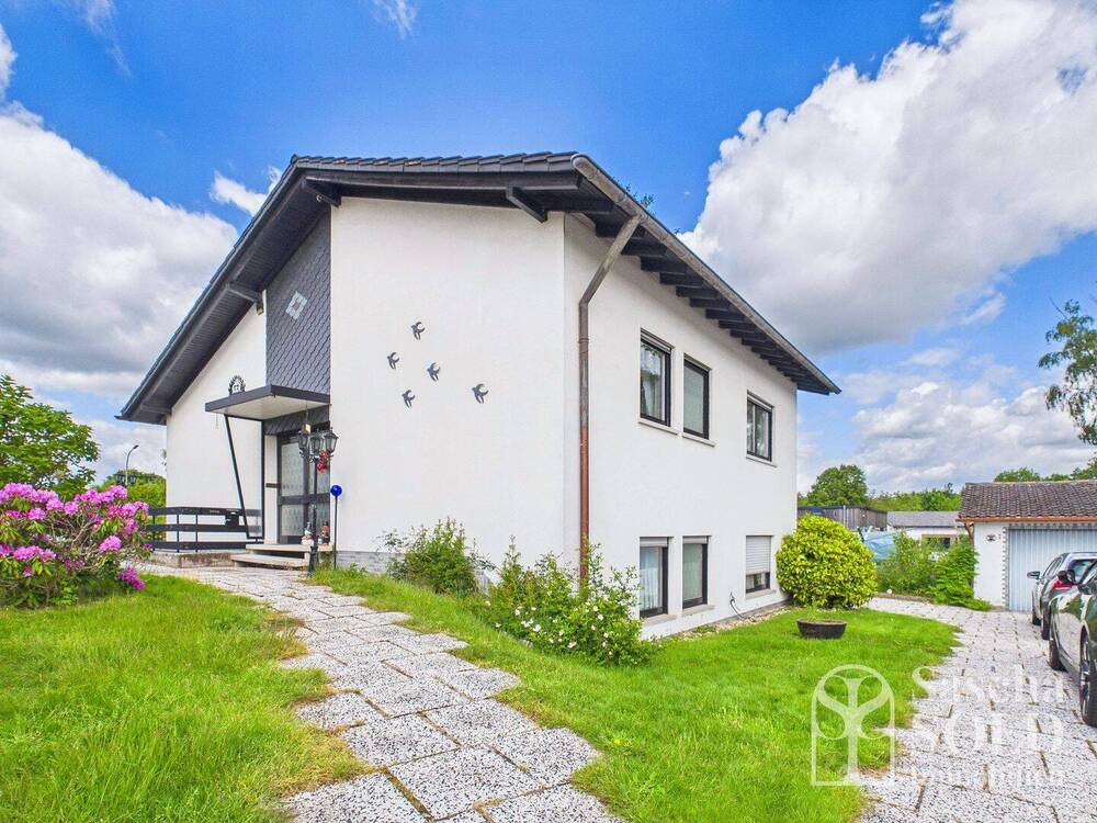 Thumbnail-Freistehendes Einfamilienhaus mit heller Wohnatmosphäre, Gartenanlage und Garage, Dorf im Warndt