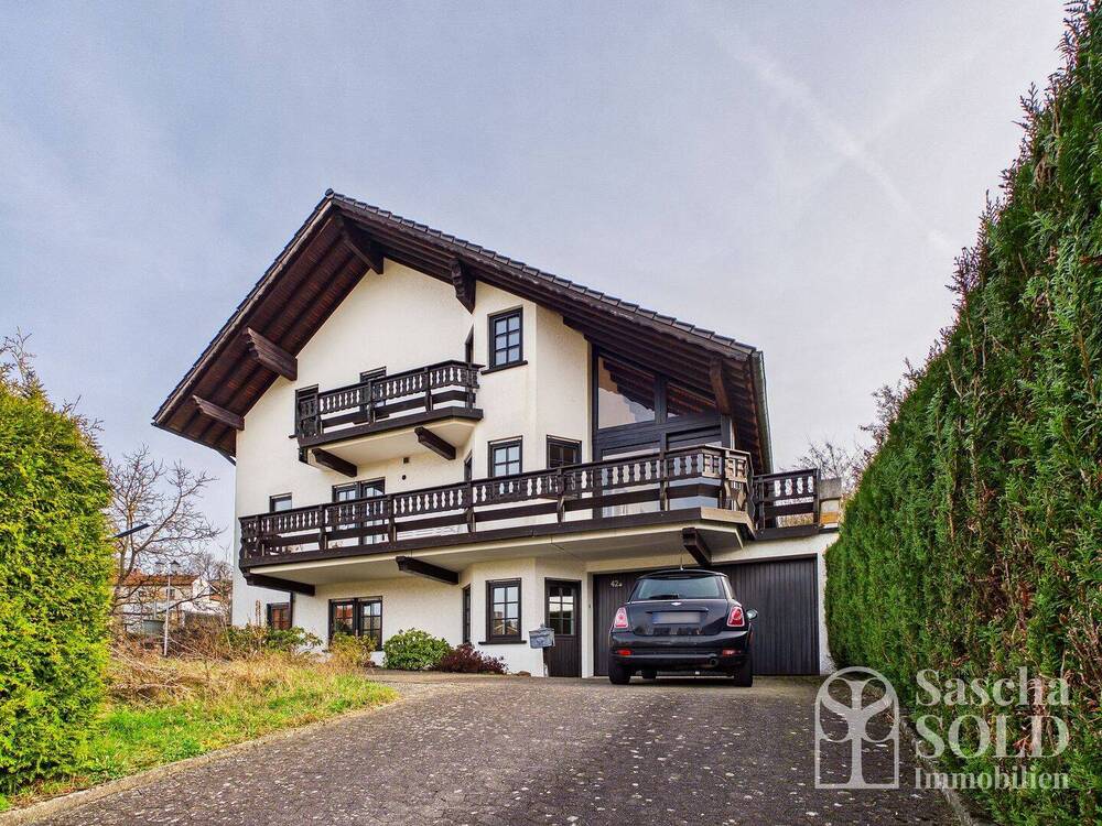 Thumbnail-Freistehendes Einfamilienhaus mit Einliegerwohnung auf weitläufigem Grundstück mit Panoramablick